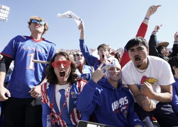 Could college make voting as popular as going to football games?