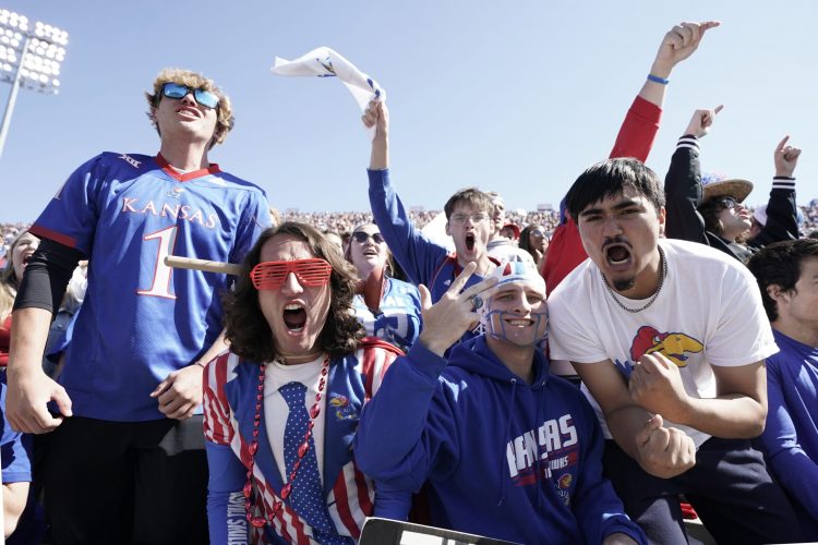 Could college make voting as popular as going to football games?