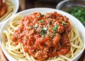 Pasta with homemade sauce in a white bowl