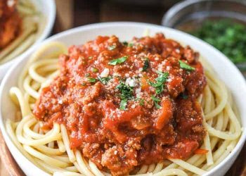 Pasta with homemade sauce in a white bowl