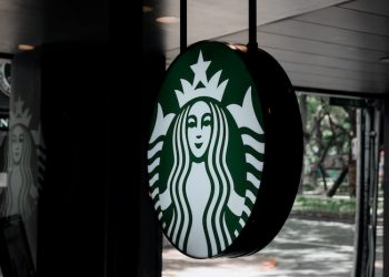 a dimly lit Starbucks store logo
