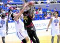 Myles Powell (left) muscles his way past Kevin Alas. He went on to torch the Road Warriors with 38 points. —PBA IMAGES